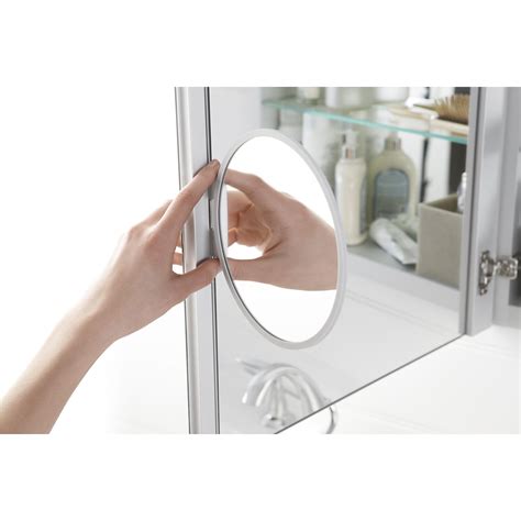 medicine cabinet with magnifying mirror